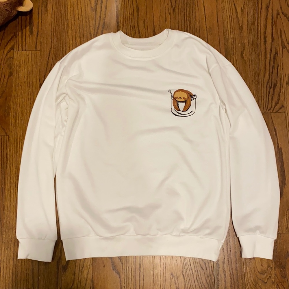 cute white sloth in a fake pocket long sleeve